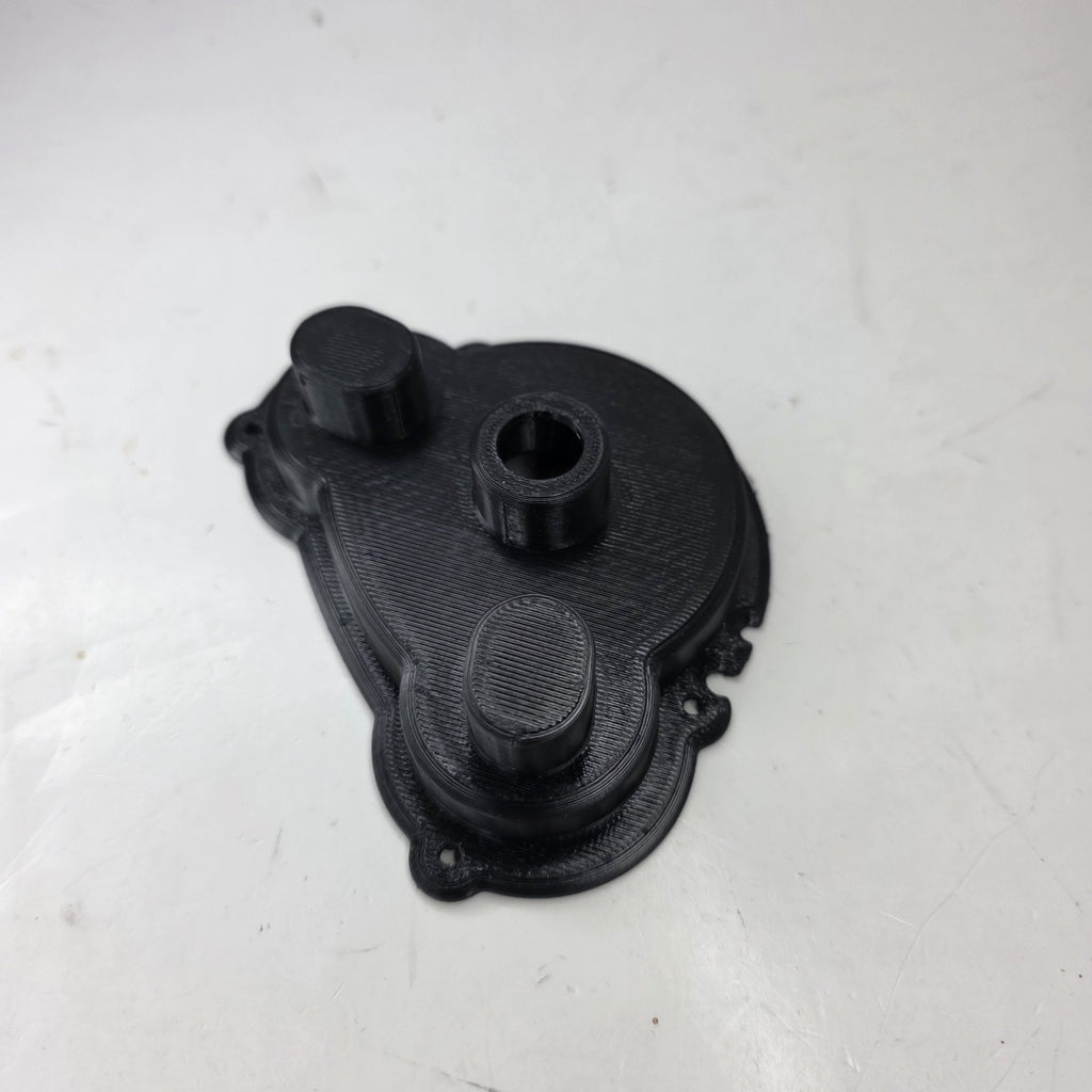 TRAXXAS 3987 MOTOR GEAR COVER  E-MAXX 14.4V BRUSHED NLA