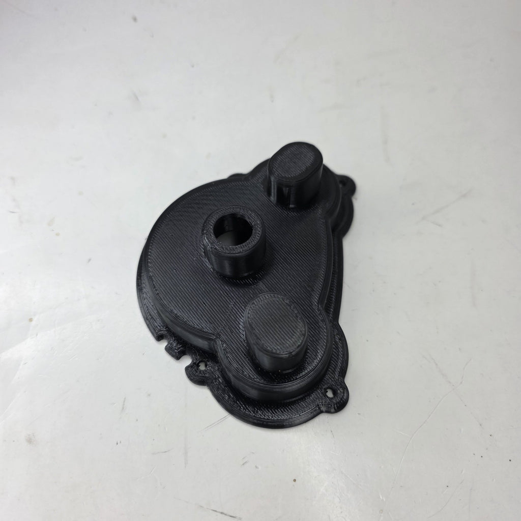 TRAXXAS 3987 MOTOR GEAR COVER  E-MAXX 14.4V BRUSHED NLA