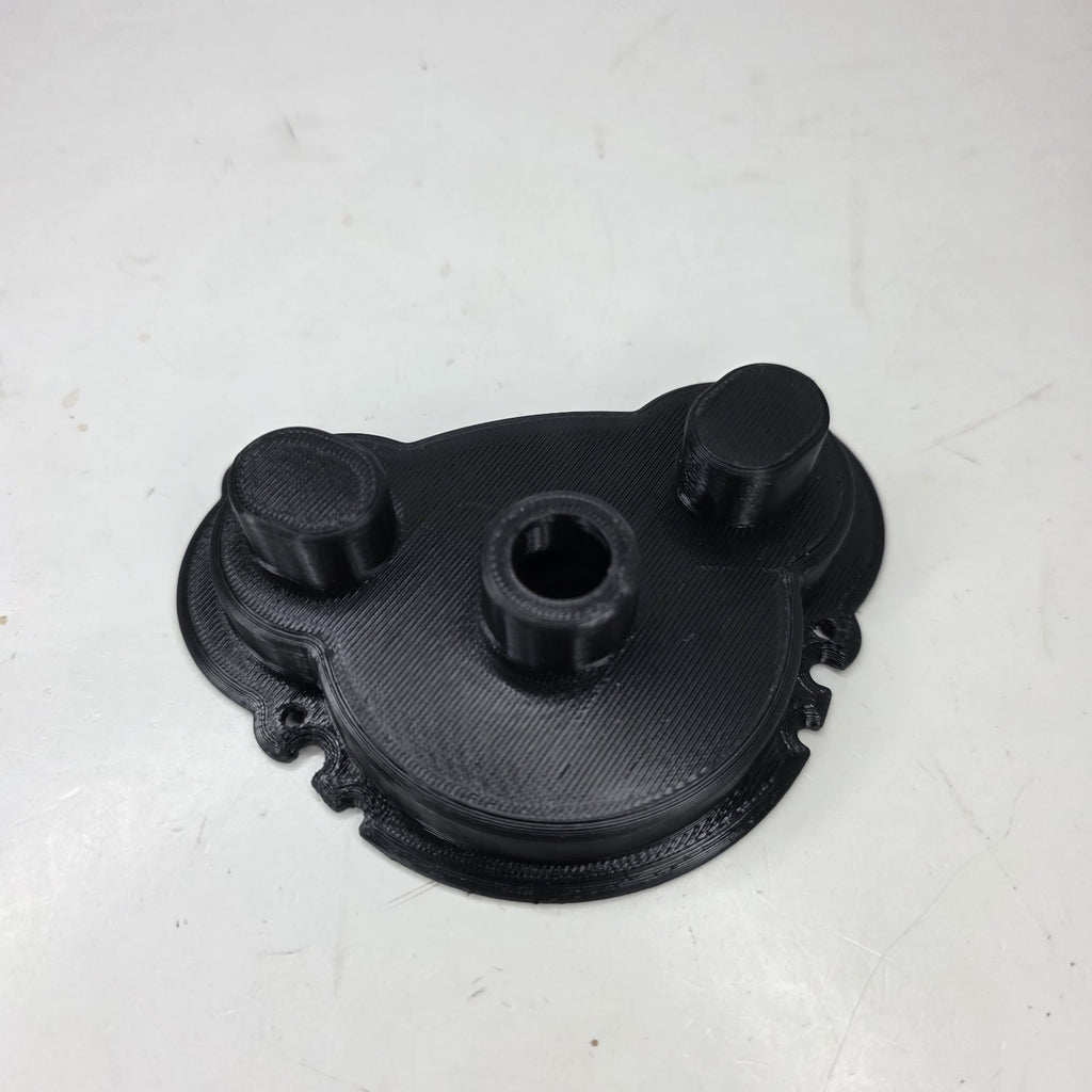 TRAXXAS 3987 MOTOR GEAR COVER  E-MAXX 14.4V BRUSHED NLA